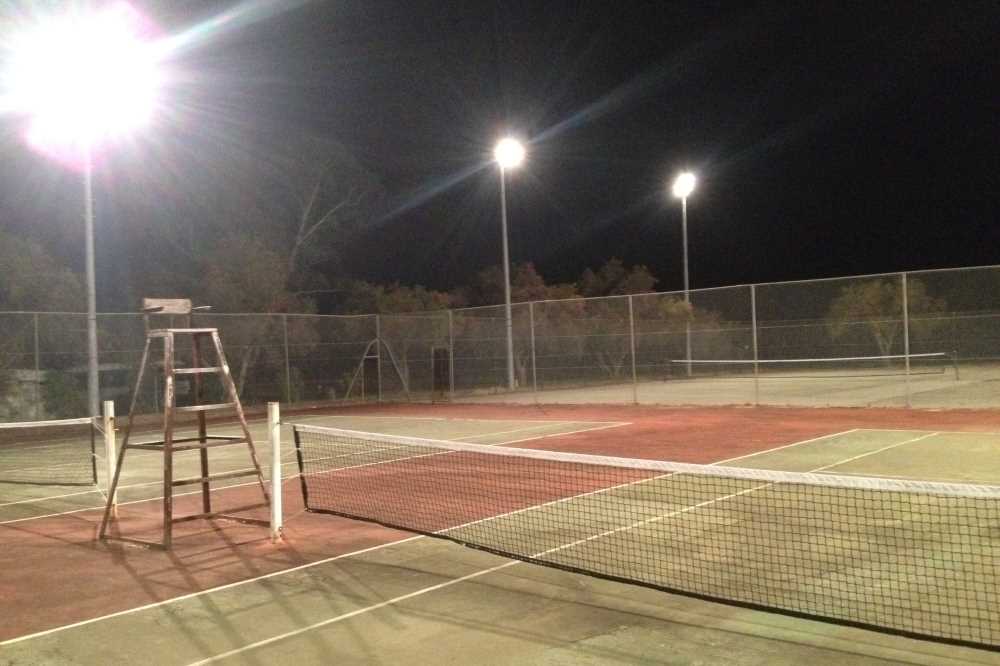 tennis court with metal halide lights